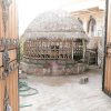 طراحی و ساخت آلاچیق سنتی چوبی نخل خرما در کرمان – قلعه گنج